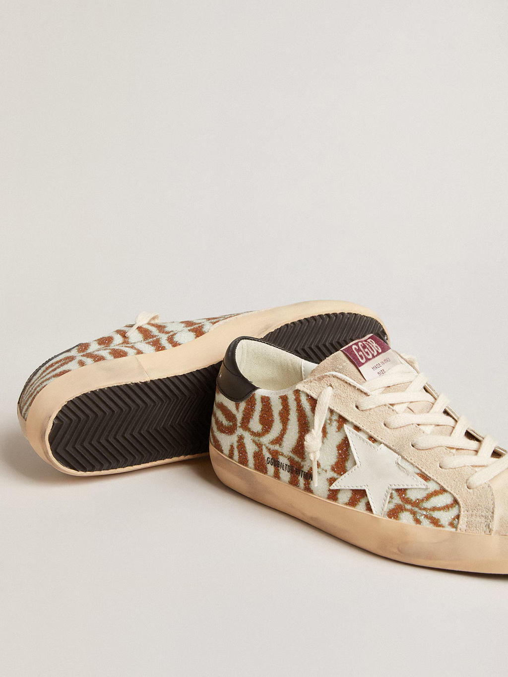 Super-Star LTD in zebra-effect Swarovski with a white leather star