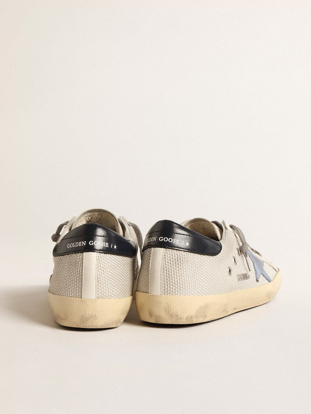 Super-Star in pale silver mesh with light blue suede star