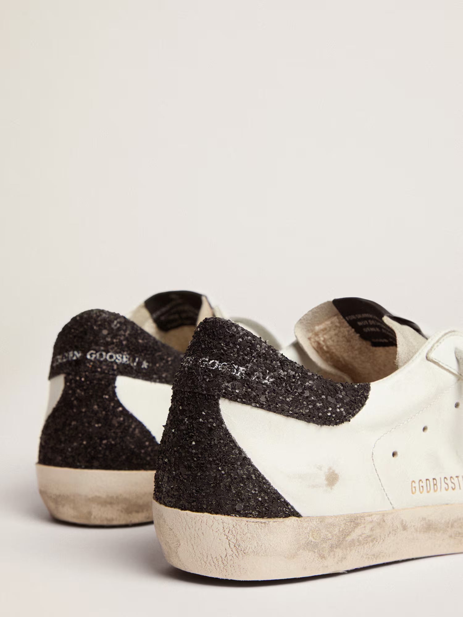 Women's Super-Star LTD with gold star and black glitter heel tab