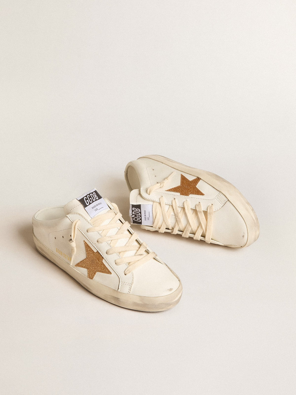 Super-Star Sabots in leather with plasticized gold glitter star