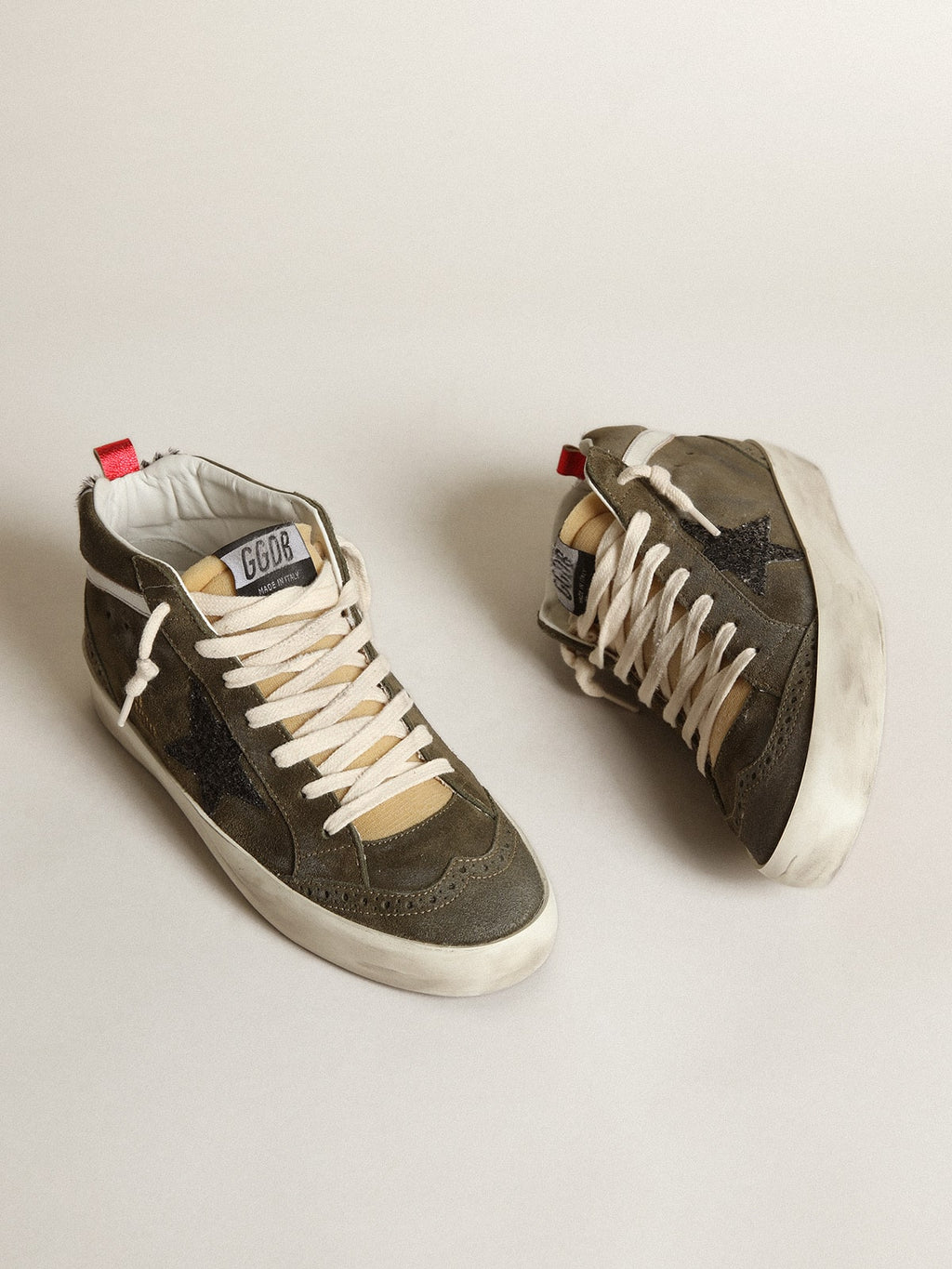 Women’s Mid-Star in olive-green suede with black glitter star and pony skin heel tab