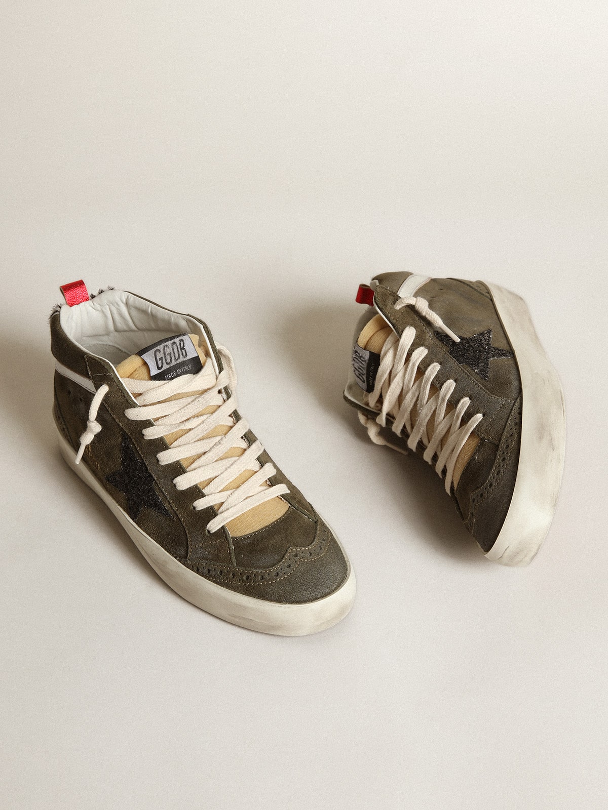 Women’s Mid-Star in olive-green suede with black glitter star and pony skin heel tab