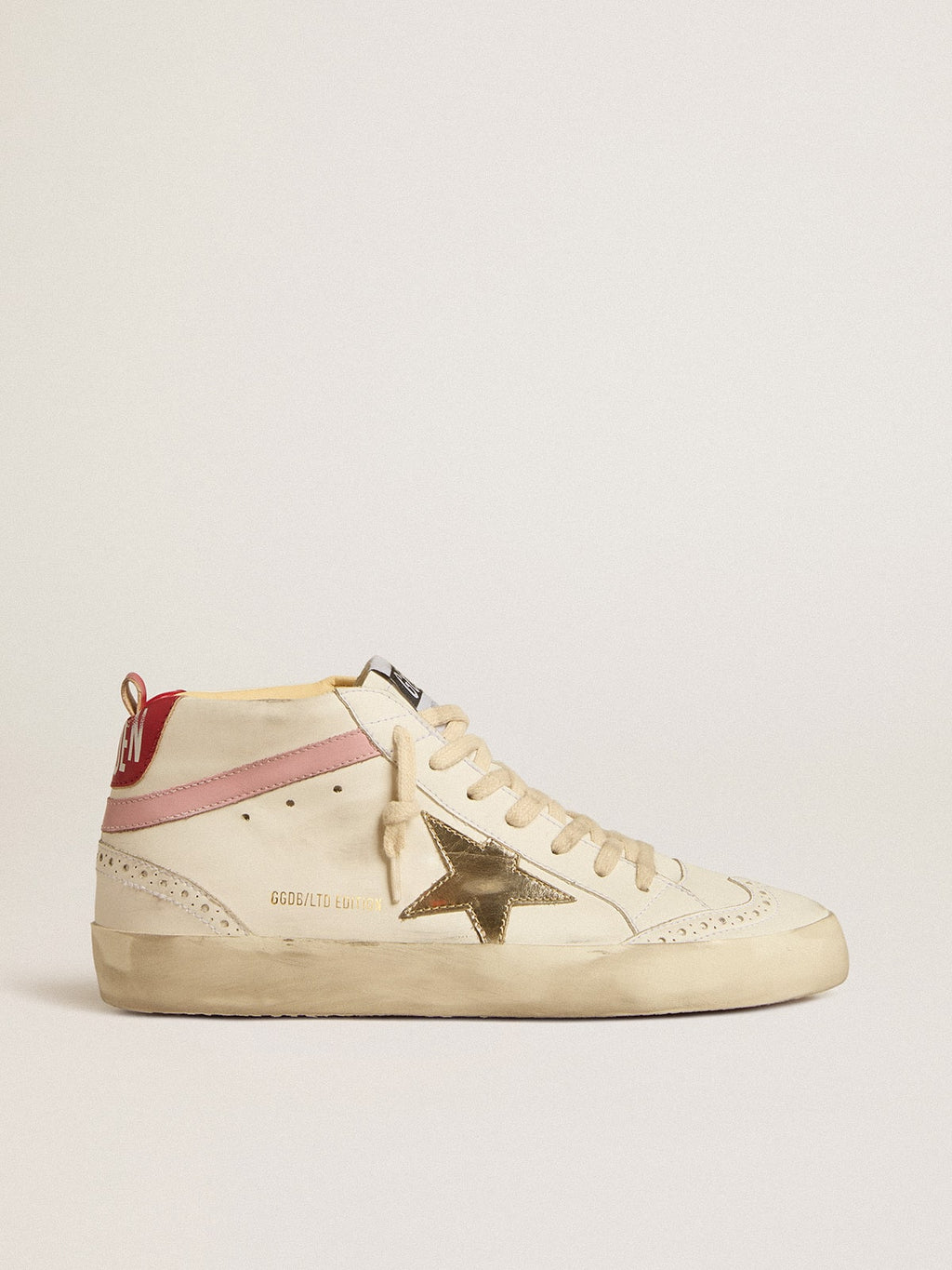 Mid Star LTD a base biologica con stella in pelle dorata e flash rosa